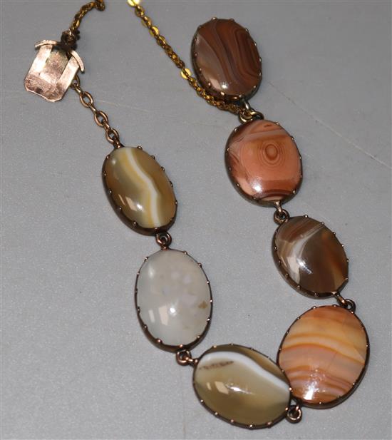 A 19th century gilt metal mounted banded agate bracelet,